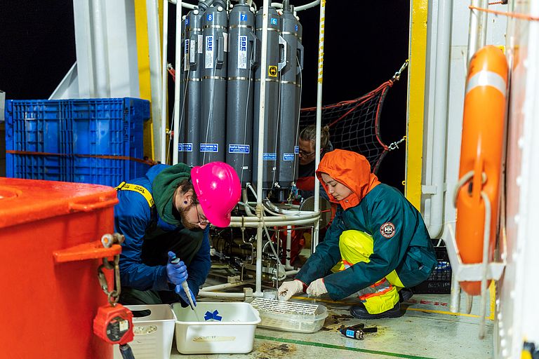 Processing of water samples on board the research vessel CORIOLIS II. Photo: Joerg Behnke, National Research Council Canada