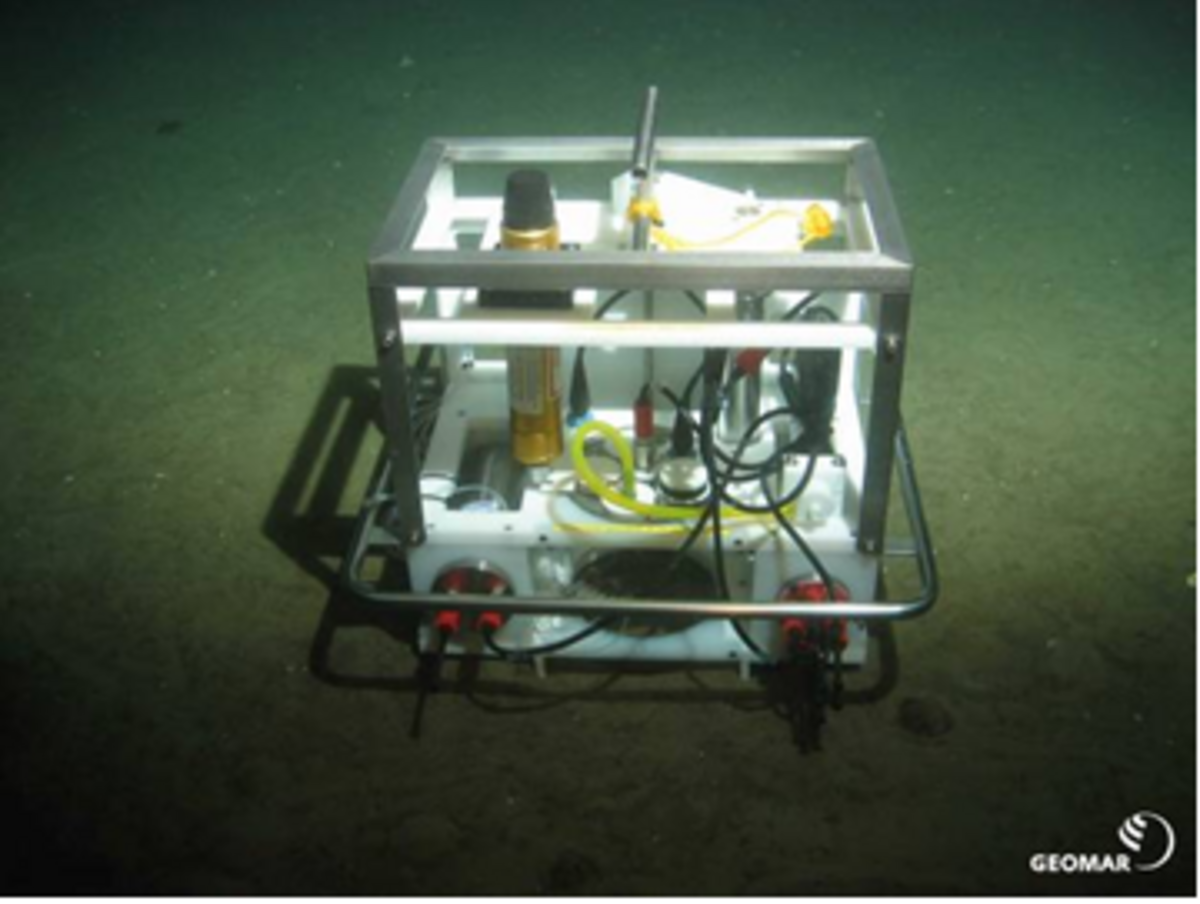 Benthic Chamber (BC) equipped with syringe water sampler, oxygen optodes, stirrer, power and control unit, and HOMER beacon deployed by ROV Kiel 6000 in the North Sea.