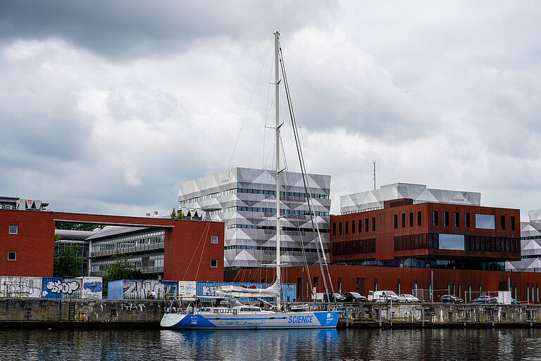 The research sailing vessel Malizia Explorer in front of the GEOMAR building