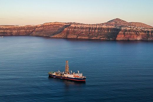 A ship in the evening sun off the coast