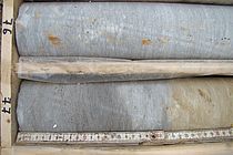 The dark layers (bottom left und and at the top) of the sediment core in 61 metres depths document that 119 million years ago the world ocean contained very little or no oxygen. Photo: Sascha Flögel, IFM-GEOMAR