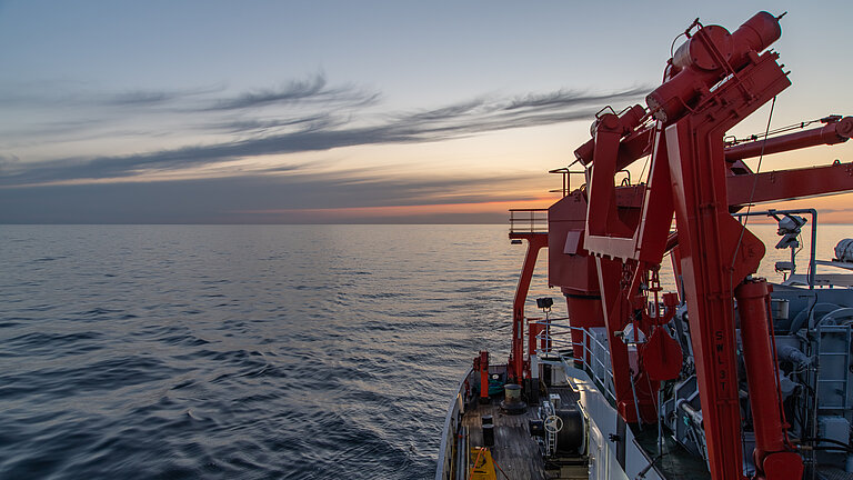 A view of the horizon over the stern of a research vessel