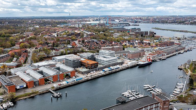 Aerial view with overview of the Schwentine, the Seefischmarkt area and the Kiel Fjord.