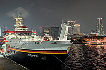 The research vessel SONNE in the port of Yokohama, Japan, at night