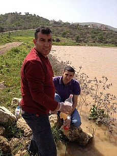 Sampling lake water near Maythaloun