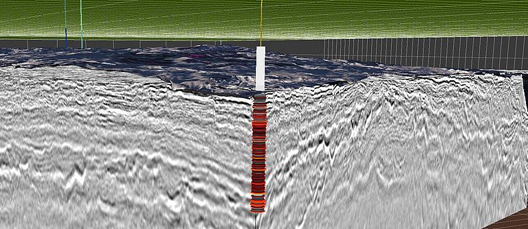 Synopsis of 3D seismic data and information from a borehole into a basaltic basement. Figure courtesy by P. Carlevaris using PaleoScan software