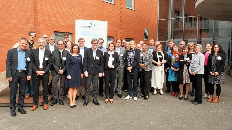 Group of people standing outside a building
