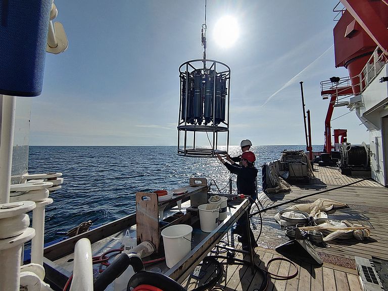 A rosette water sampler is deployed in the Baltic Sea from aboard the research vessel ALKOR. Photo: Jan Dierking, GEOMAR