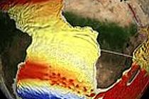 Temperaturen und Strömungen in 450 m Tiefe des hochauflösenden Kieler Computermodells (Momentanaufnahme). Der Agulhasstrom fließt entlang der südafrikanischen Küste. Südwestlich von Kapstadt vollzieht er eine abrupte Kehrtwende zurück in den Indischen Ozean. Dabei schnürt er Wirbel („Agulhasringe“) ab, die warmes und salzreiches Wasser in den Atlantik transportieren.Strömungen um Südafrika (Momentanaufnahme).