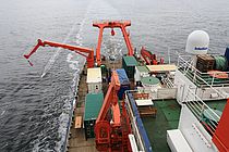 The FS Meteor sailing through the South Atlantic. The equipment being towed on the left is a water sampler, connected to a ‘clean air’ laboratory on the deck of the ship, used to collect water for the experiments without contamination. Photo: Angela Stippkugel, GEOMAR