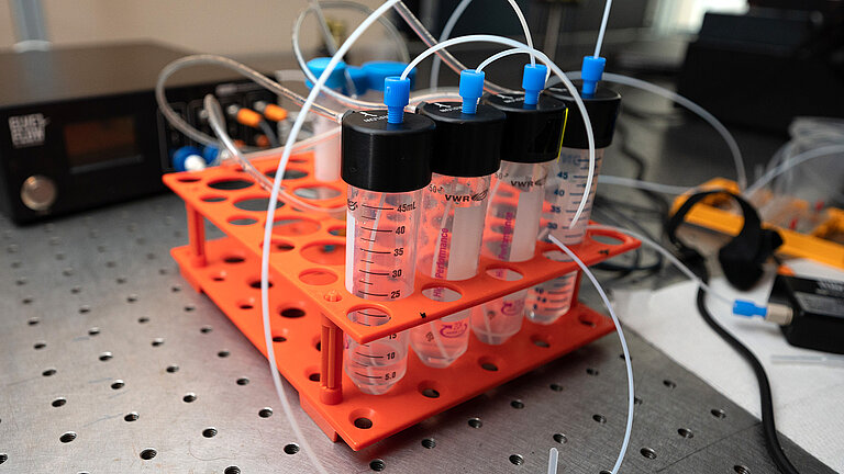 Subgoal 3 also develops automatic water-sampling and droplet-based microfluidic lab-on-a-chip solutions.