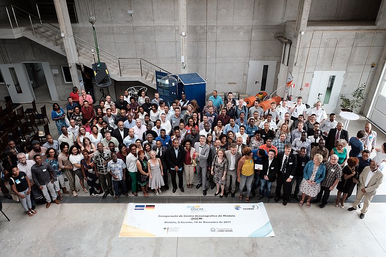 Representatives of the Republic of Cabo Verde and participants of the International Workshop on Marine and Atmospheric Science in West Africa celebrate the scientific opening of the OSCM. Photo: J. Steffen, GEOMAR.