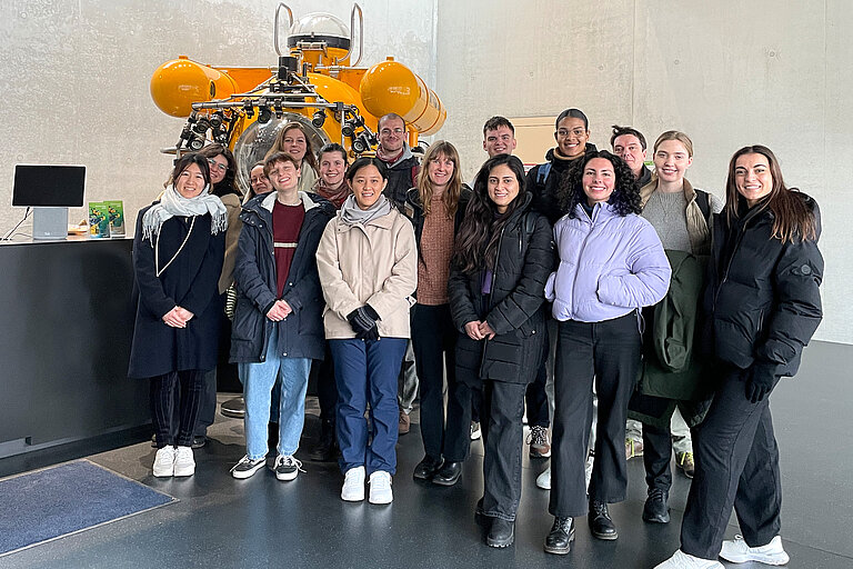 Participants of the GAME project 2024 in front of research submersible JAGO at GEOMAR.